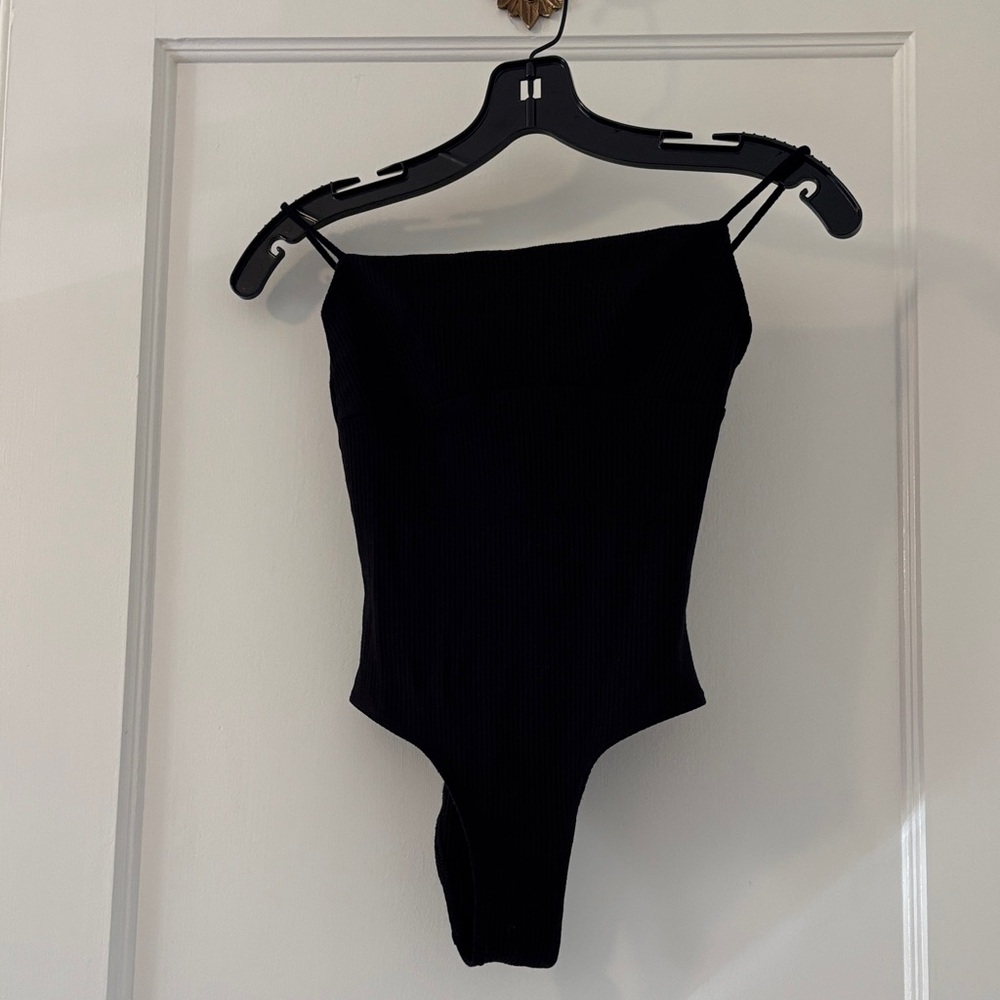 Angie Bauer S Black Ribbed Bodysuit